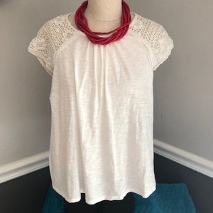 Cream top with crochet sleeves